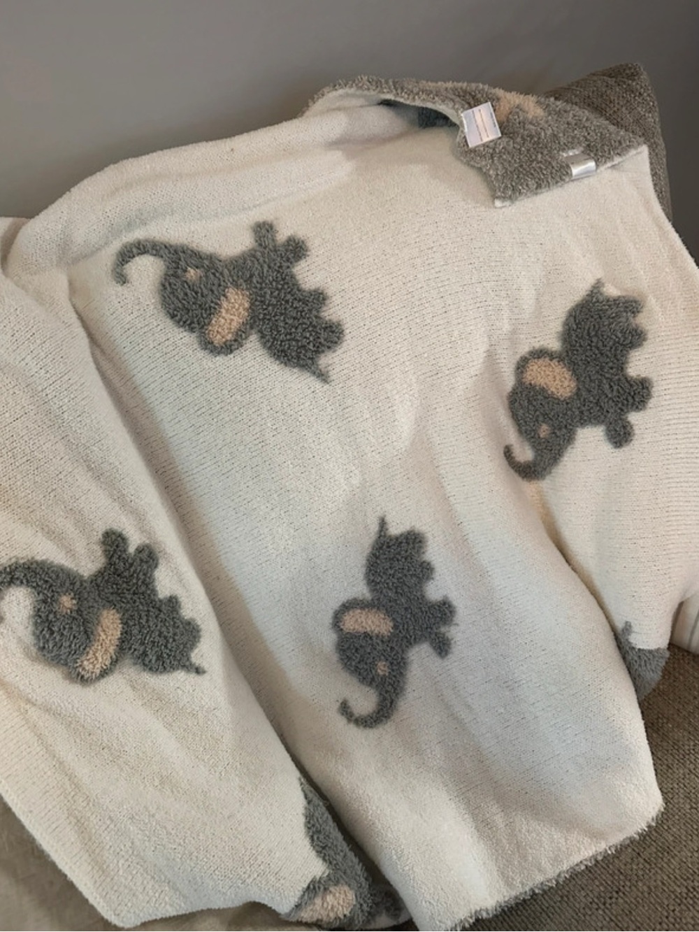 Ivory and Gray Elephant Print blanket and pillow set from the styled collection
